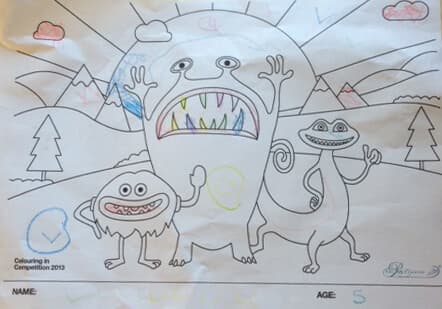 Colouring competition entry: three monsters in front of mountains sun clouds trees mainly blue brown and yellow