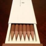 Brown Graf von Faber-Castell No.III desk pencils neatly arranged in an open white box