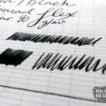 Diamine Green Black ink swatches and writing samples on lined notebook paper