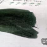 Diamine Green Black fountain pen ink swatch on white paper showing dark green shading