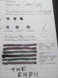 Handwritten ink test and writing samples of Graf Von Faber-Castell Stone Grey ink on lined paper