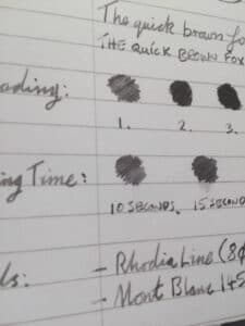 Handwritten ink swatches and notes testing Graf Von Faber-Castell Stone Grey ink on paper