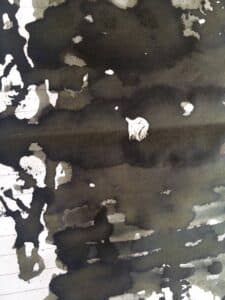 Graf Von Faber-Castell Stone Grey ink swatch showing dark and light grey shading on paper