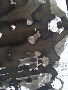 Graf Von Faber-Castell Stone Grey ink swatch with shading and handwritten notes on paper