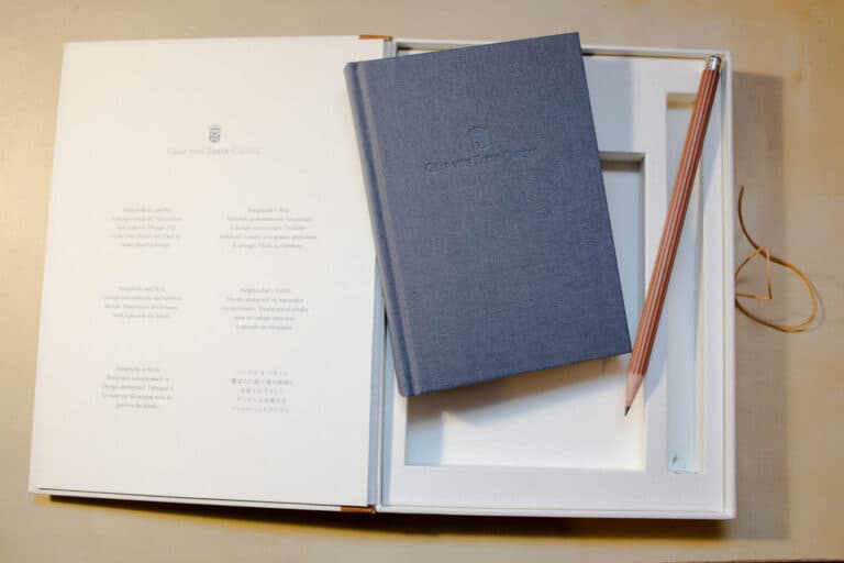 Graf von Faber-Castell blue hardcover journal and wooden pencil in white presentation box