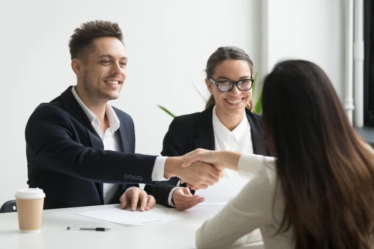 Applicant getting the job in an interview after perfect cover letter