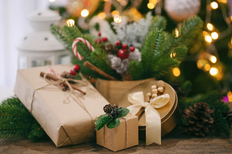 Luxury gifts wrapped under the Christmas tree.