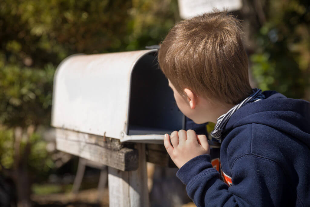 Boy awaiting a letter
