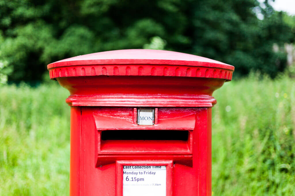 A red Royal Mail postbox