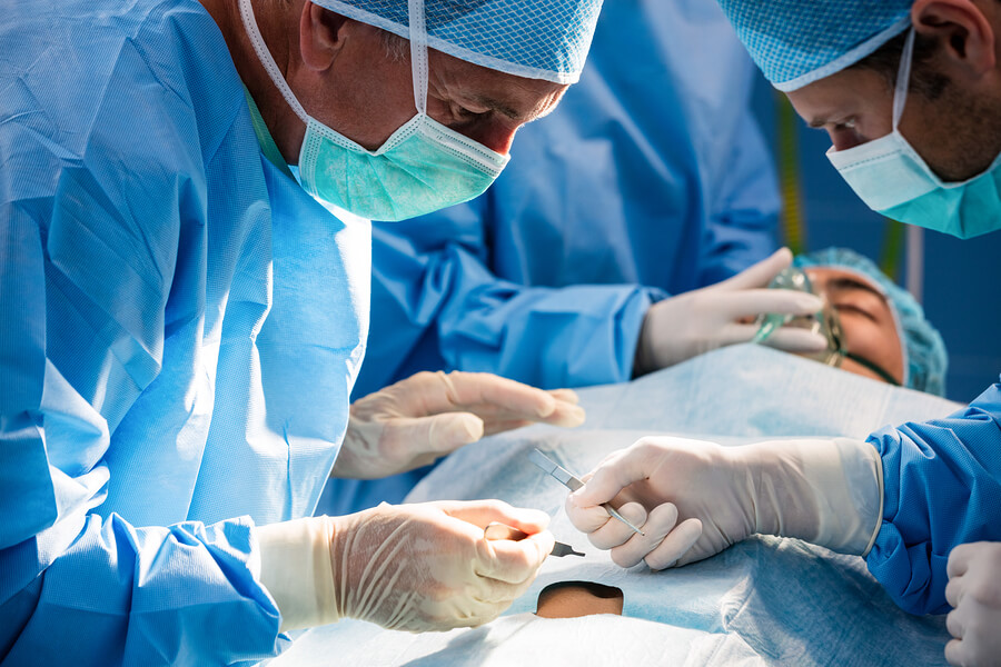 Surgeons performing an operation in hospital