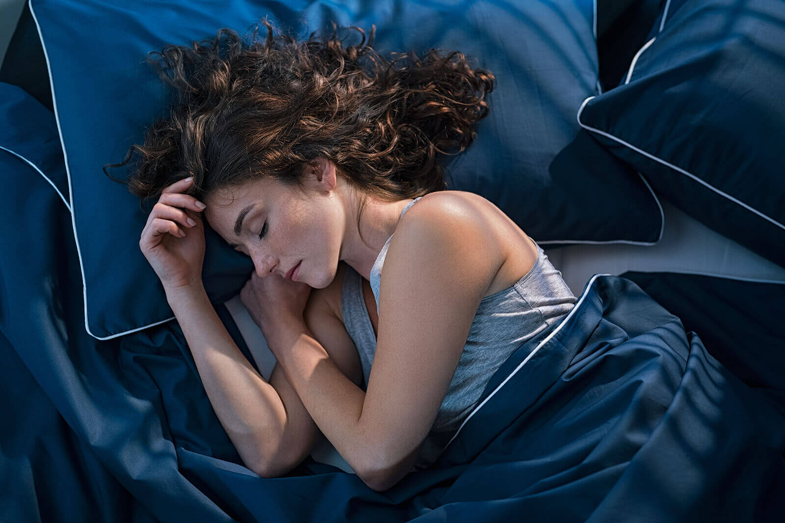 bigstock-Top-view-of-young-woman-sleepi-401842373 (1)