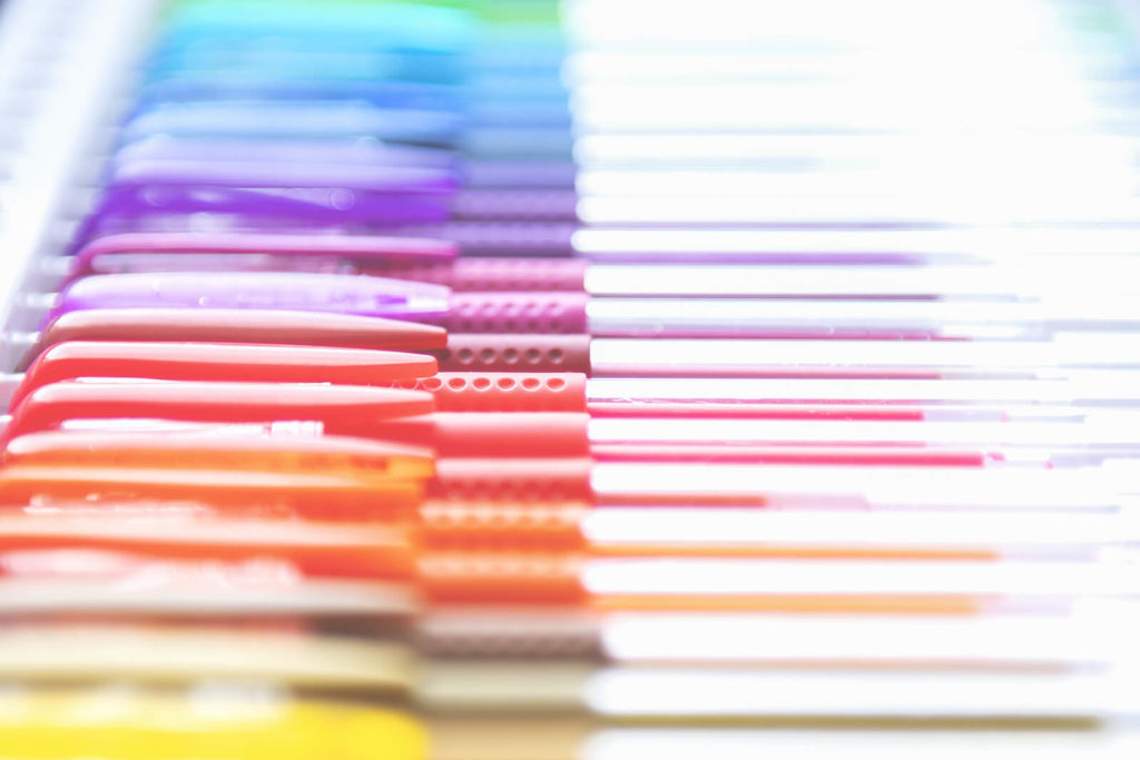 A row of gel pens, each a different, bright colour