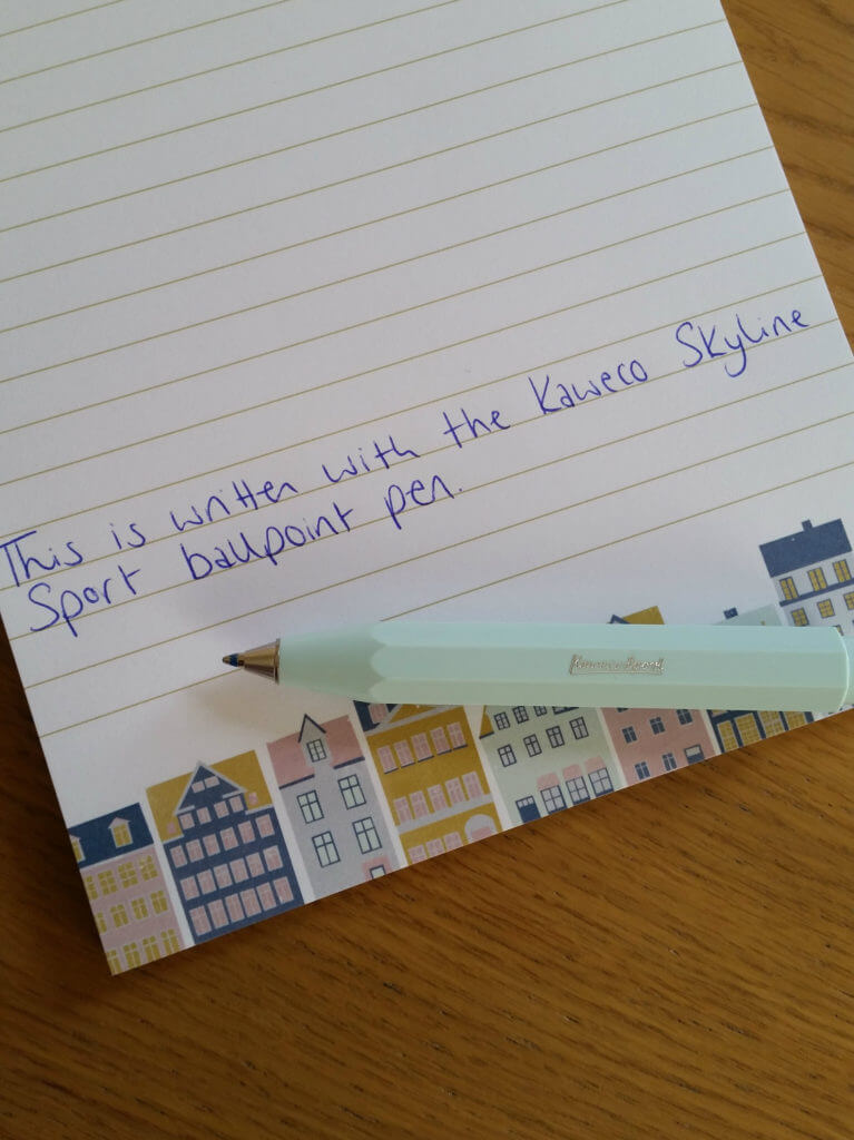 The Kaweco Skyline Sport ballpoint pen with an example of its writing