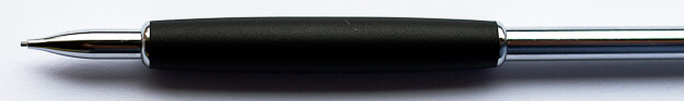 The grip is only slightly narrower than a wood-cased pencil